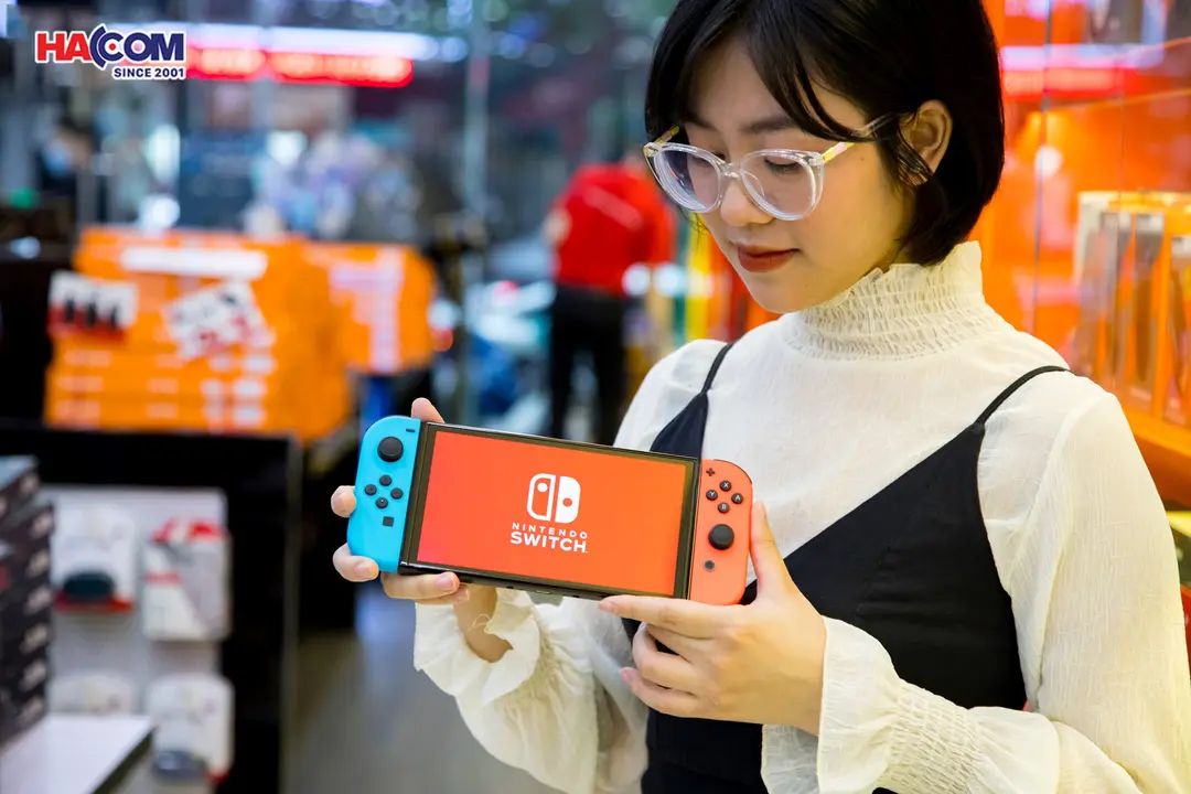 69258_may_choi_game_nintendo_switch_oled_red_and_blue_xanh_do_02.jpg 6