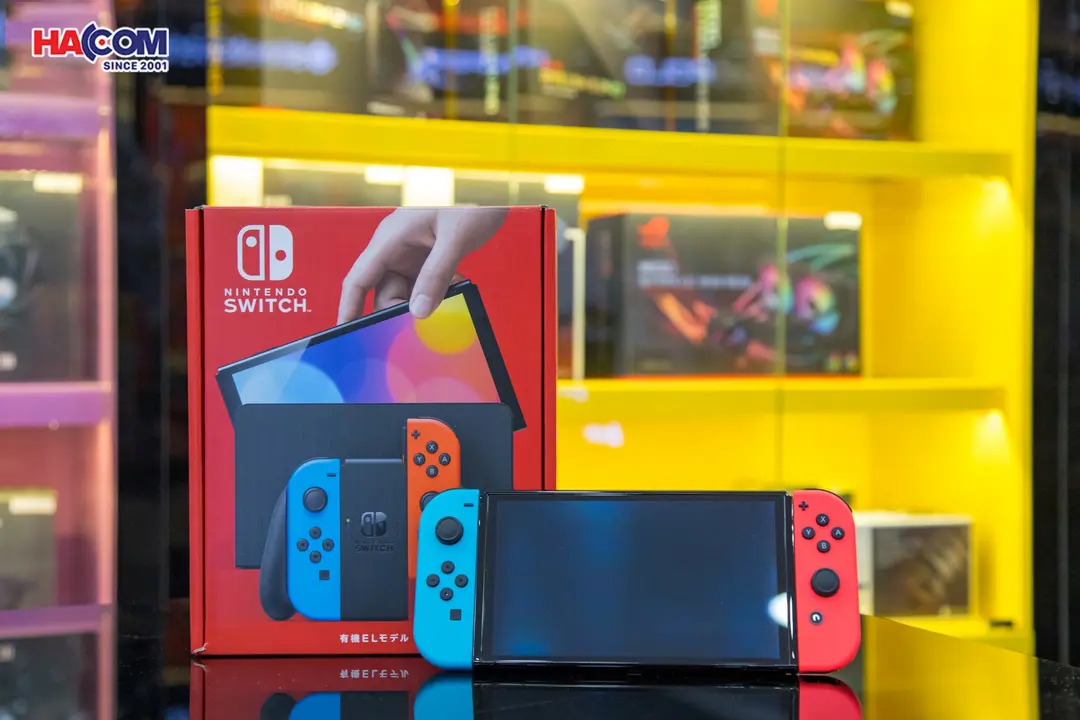 69258_may_choi_game_nintendo_switch_oled_red_and_blue_xanh_do_03.jpg 7
