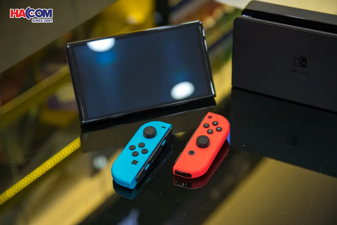 69258_may_choi_game_nintendo_switch_oled_red_and_blue_xanh_do_07.jpg 11