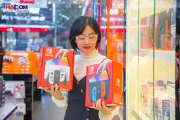 69258_may_choi_game_nintendo_switch_oled_red_and_blue_xanh_do_01.jpg 5