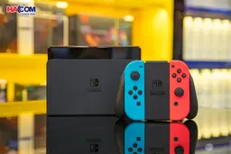69258_may_choi_game_nintendo_switch_oled_red_and_blue_xanh_do_06.jpg 10