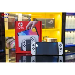 61005_may_choi_game_nintendo_switch_oled_white_trang_02.jpg 9