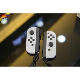 61005_may_choi_game_nintendo_switch_oled_white_trang_09.jpg 16