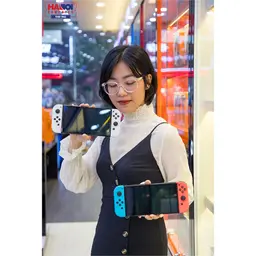 61006_may_choi_game_nintendo_switch_oled_red_and_blue_xanh_do_019.jpg 22