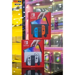 61006_may_choi_game_nintendo_switch_oled_red_and_blue_xanh_do_01.jpg 4