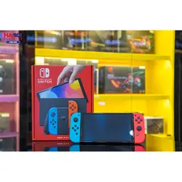 61006_may_choi_game_nintendo_switch_oled_red_and_blue_xanh_do_02.jpg 5