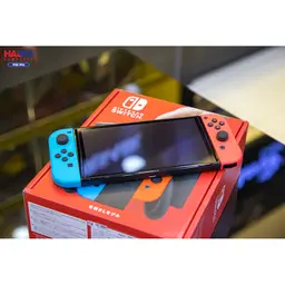 61006_may_choi_game_nintendo_switch_oled_red_and_blue_xanh_do_04.jpg 7