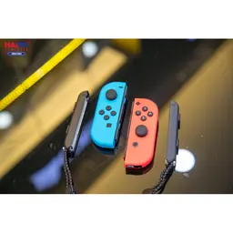 61006_may_choi_game_nintendo_switch_oled_red_and_blue_xanh_do_08.jpg 11