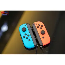 61006_may_choi_game_nintendo_switch_oled_red_and_blue_xanh_do_09.jpg 12
