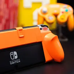 73141_neogrip_set_skull_co_for_nintendo_switch_oled_gamecube_orange_5.jpg 4