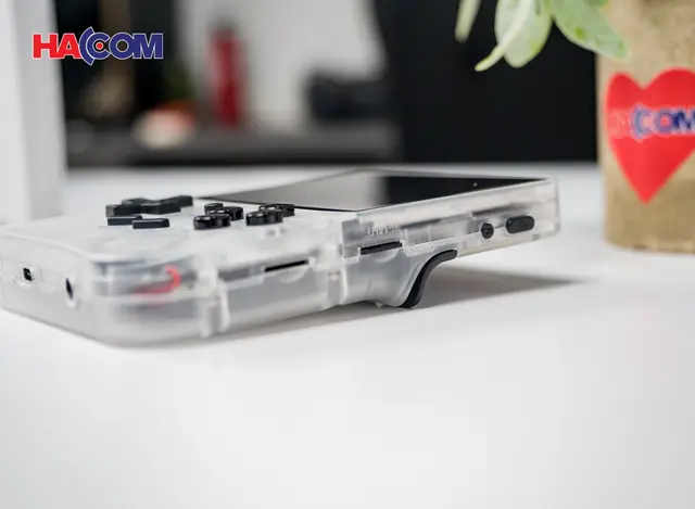 72125_may_choi_game_cam_tay_anbernic_rg35xx_mau_trang_008.JPG 9