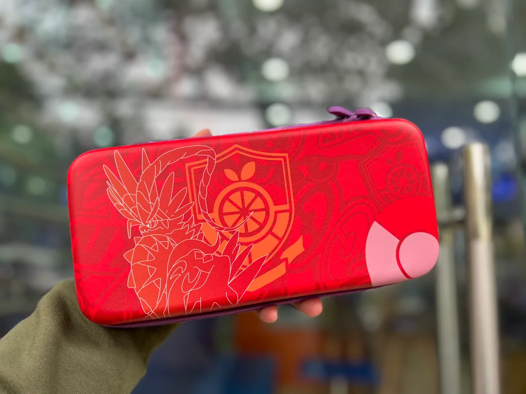 69286_bao_dung_bao_ve_may_nintendo_switch_tim_do_pokemon_02.jpg 1