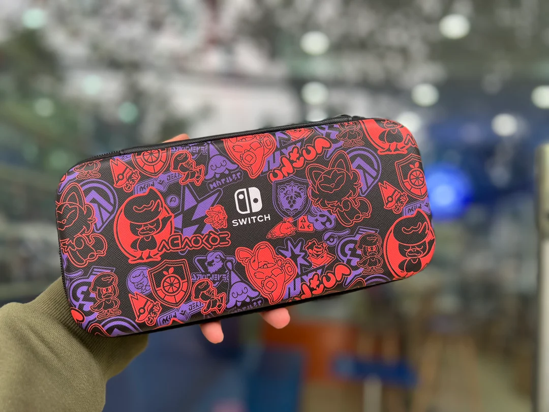 69287_bao_dung_bao_ve_may_nintendo_switch_hoa_tiet_den_do_pokemon.jpg 0