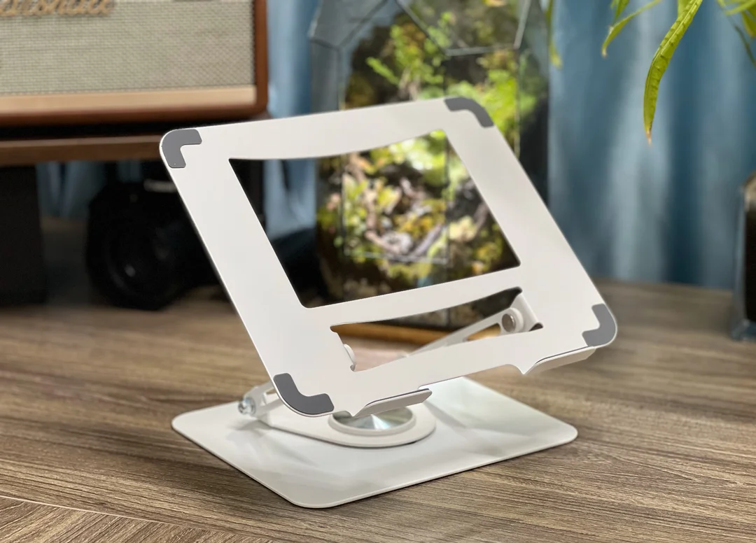 80914_gia_do_laptop_macbook_ipad_tabblet_e606_de_xoay_360_do_hop_kim_thep_mau_trang__2_.jpg 0