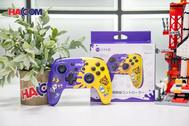 67987_tay_cam_choi_game_iine_splatoon_3_cho_nintendo_switch_switch_lite_switch_oled_mau_tim_pha_vang_001.JPG 2